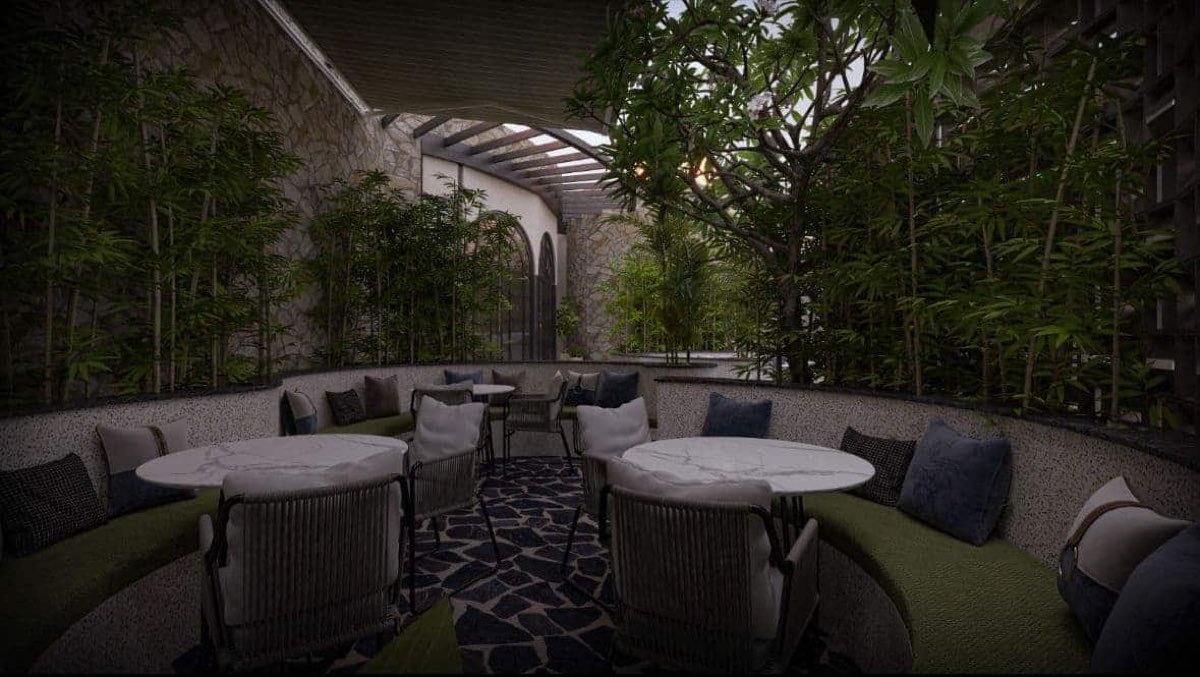 Curved garden seating nook surrounded by bamboo